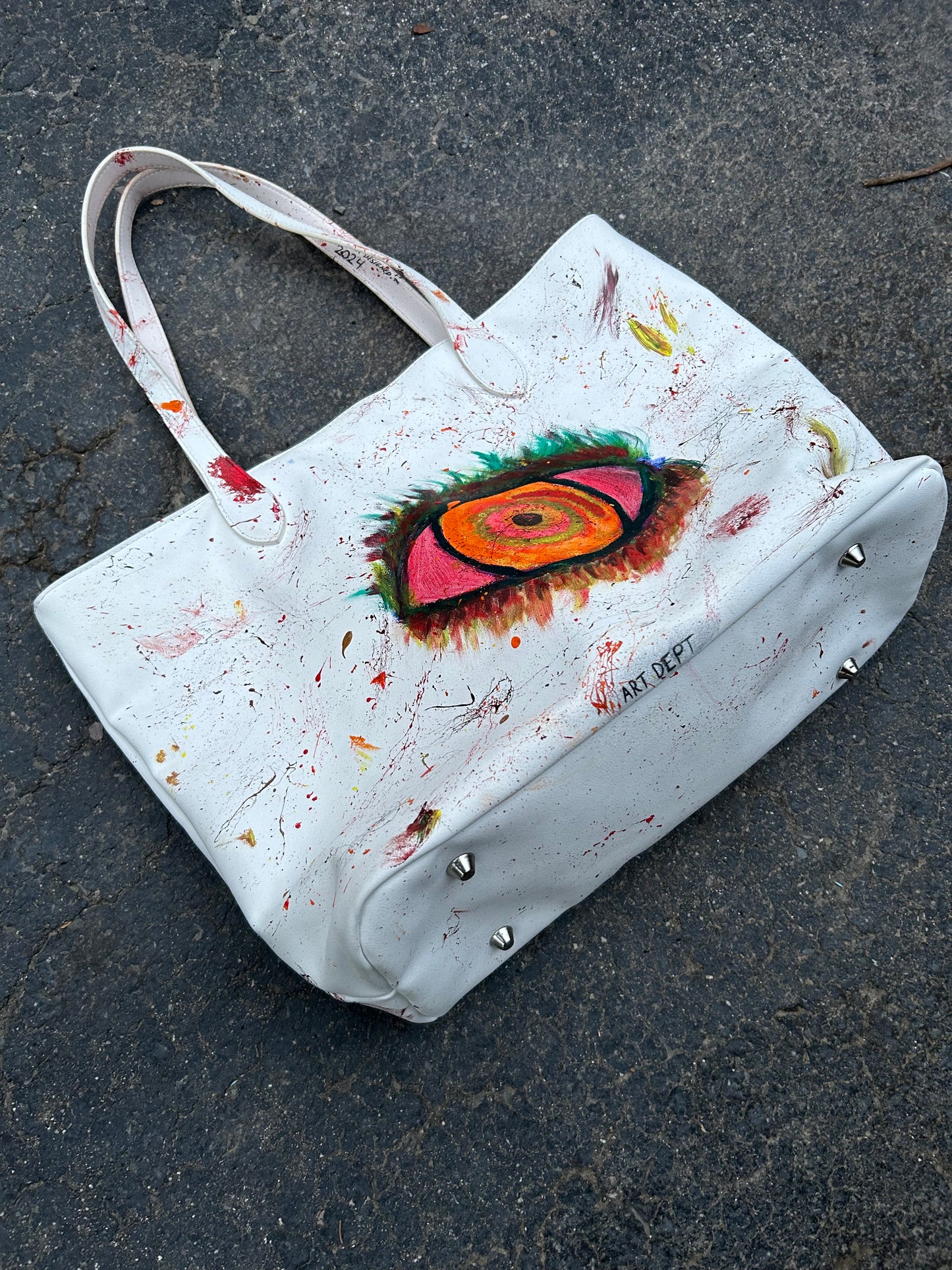 “EYE TO EYE” LEATHER SIDE PURSE